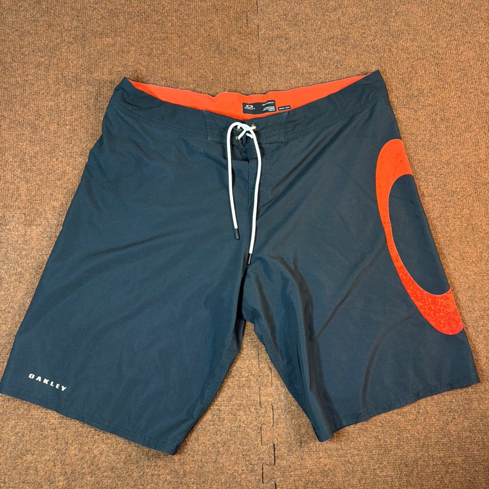 A+ Oakley Performance Fit Board Shorts Mens 38 Black Orange Ellipse Swim Trunks